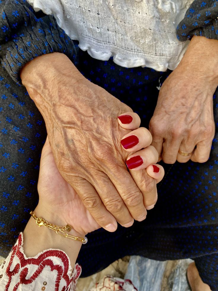 Hands held together in a gesture of care and trust