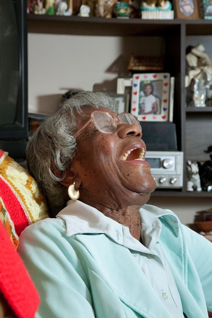 A joyful senior woman laughing at home in Connecticut